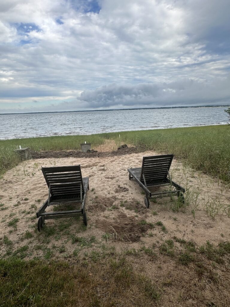 Two lounge chairs beckoning me to sit and see more