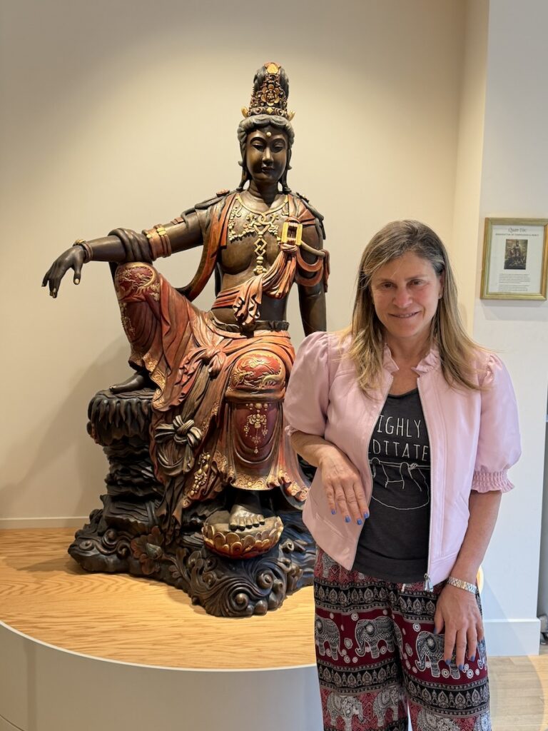 Lisa Cooper and Buddha Statue at Spirit Rock