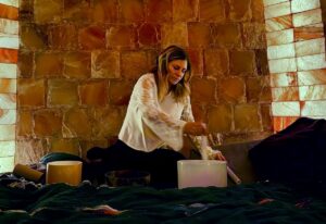 Lisa Cooper of Harmonious Healing Doing a Sound Bath in a Salt Cave
